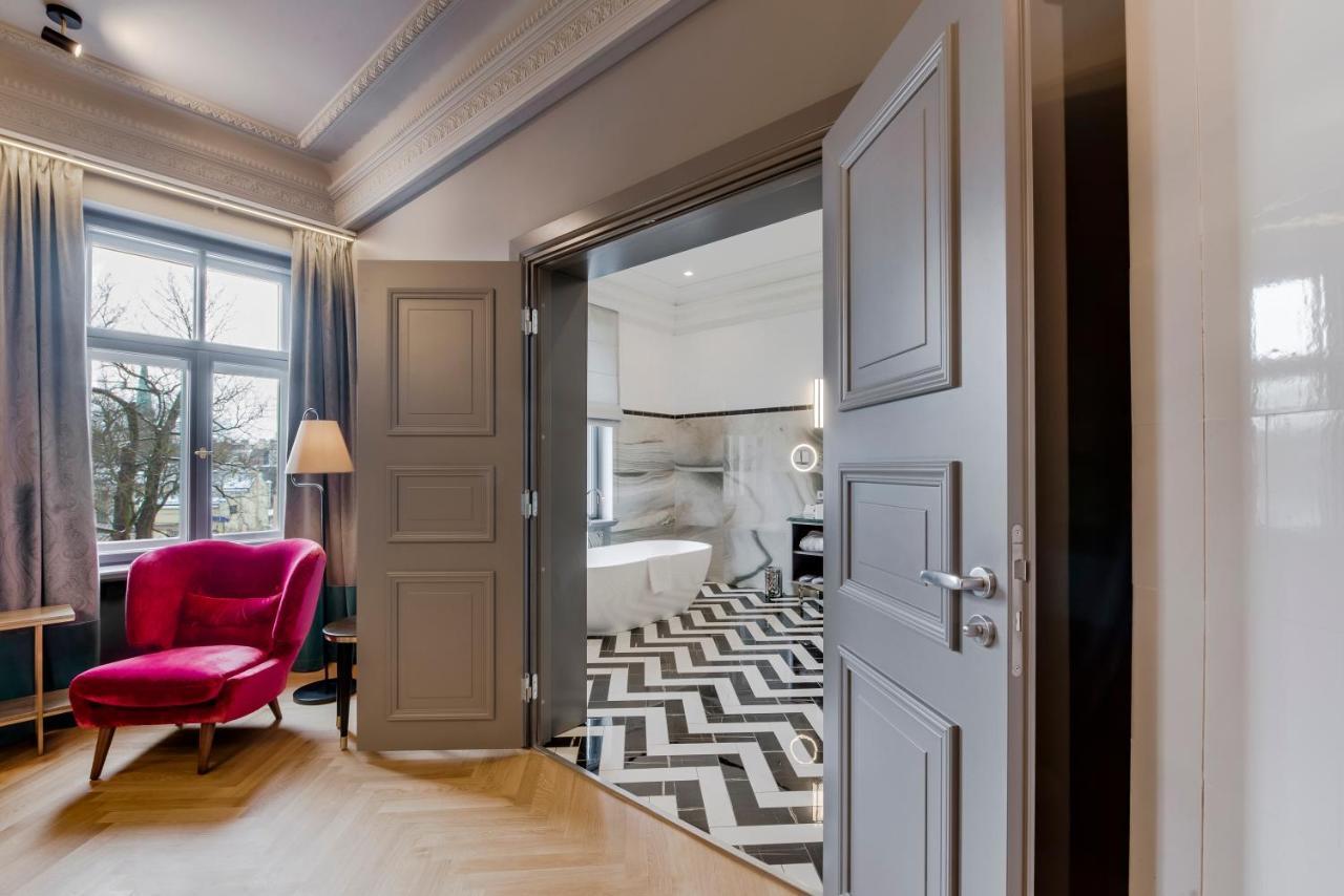 Grand Poet Hotel And Spa By Semarah Riga Luaran gambar A room at the hotel