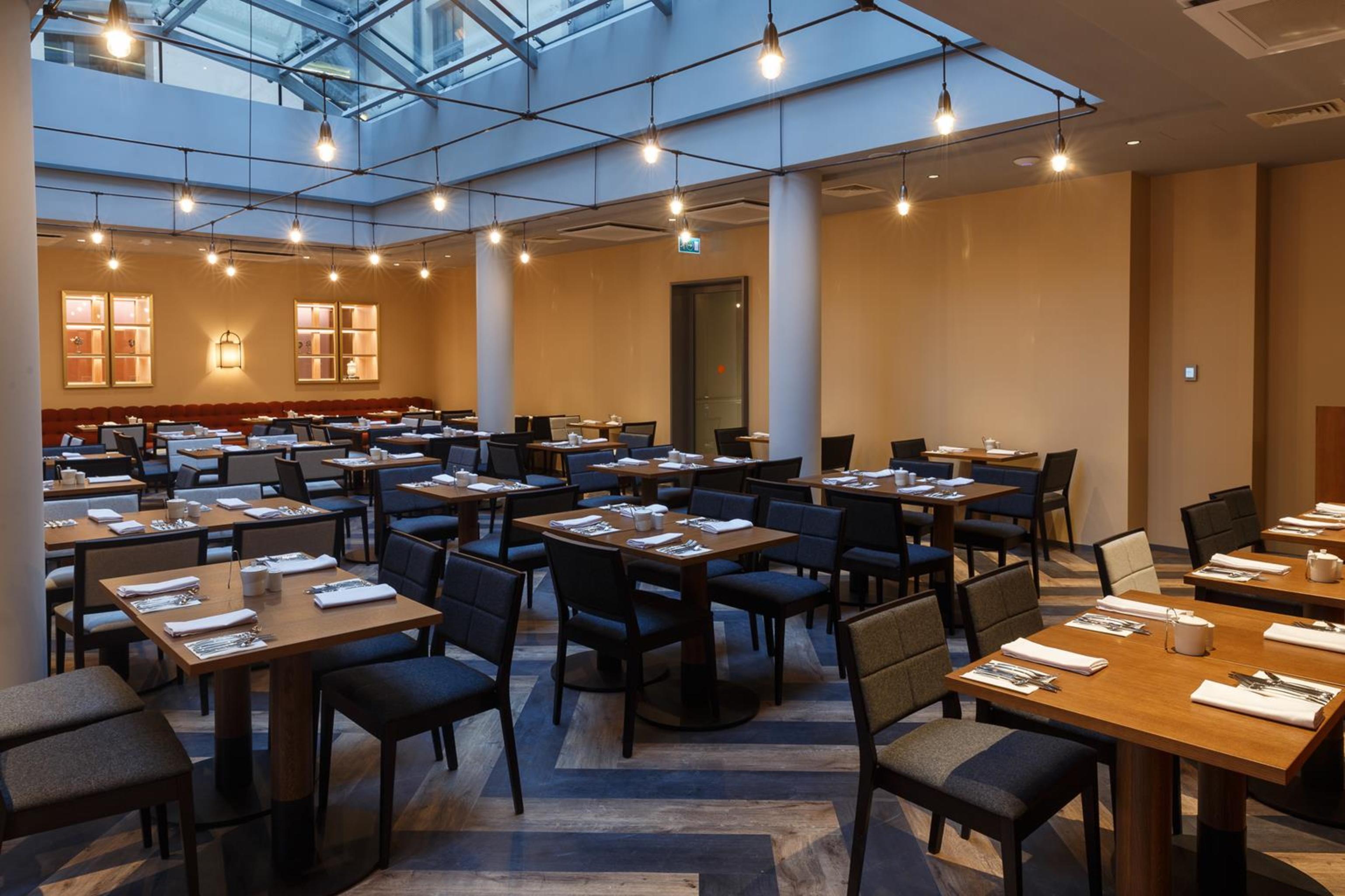 Grand Poet Hotel And Spa By Semarah Riga Luaran gambar The restaurant