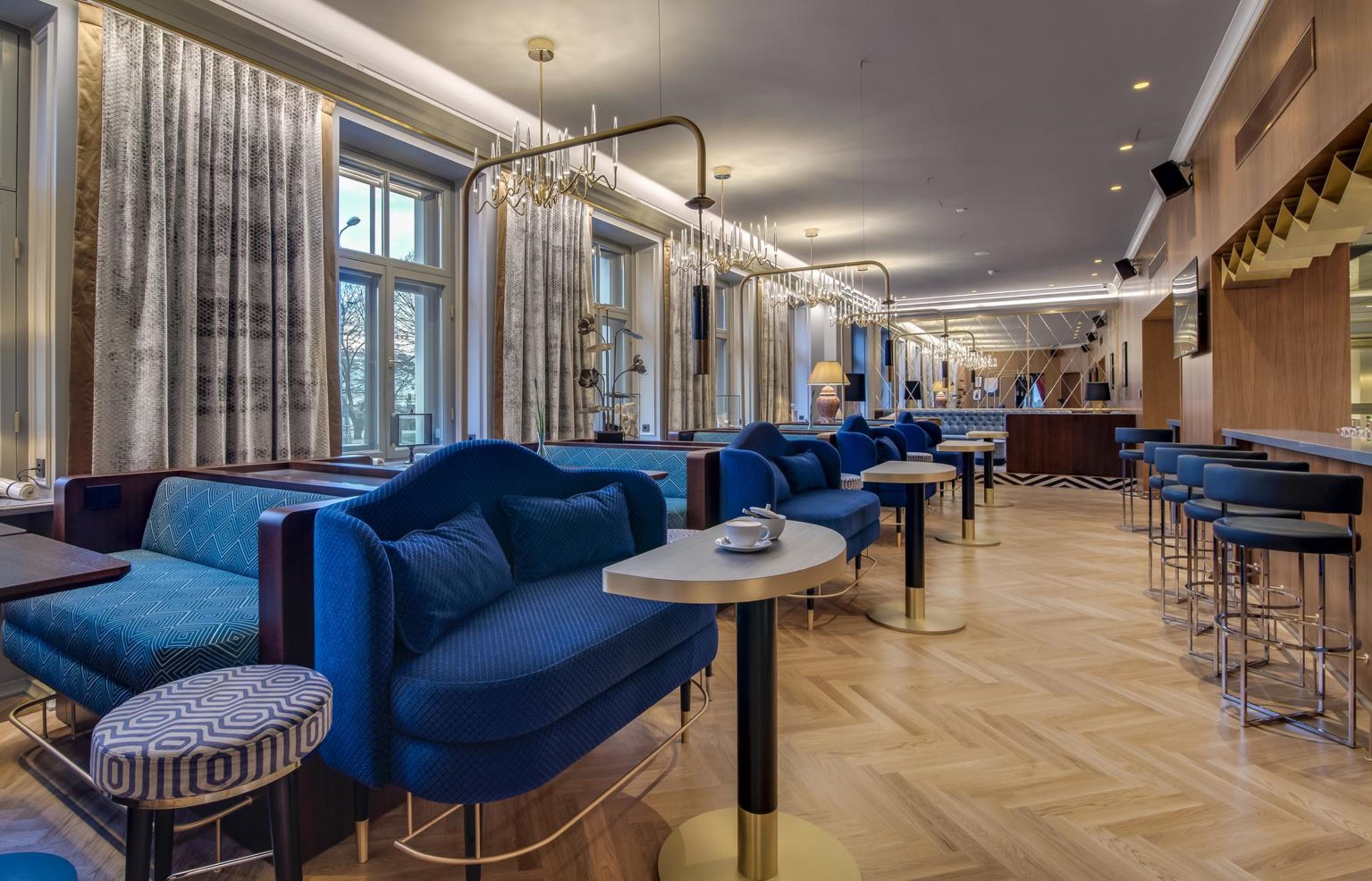 Grand Poet Hotel And Spa By Semarah Riga Luaran gambar The Lounge at the InterContinental Prague