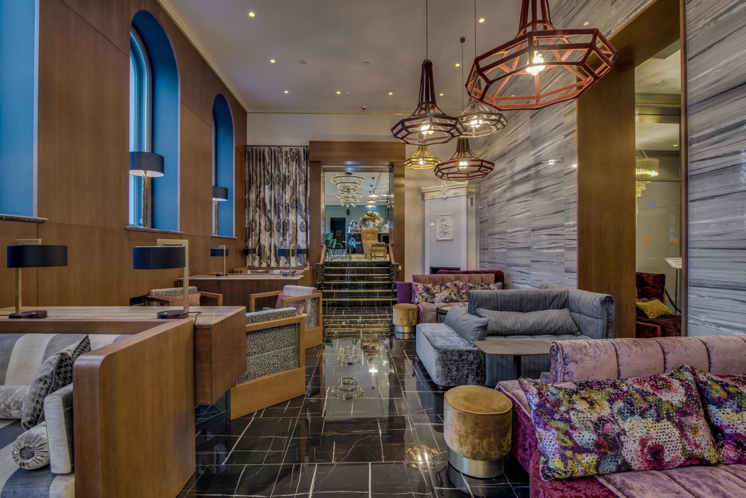 Grand Poet Hotel And Spa By Semarah Riga Luaran gambar The interior of the hotel