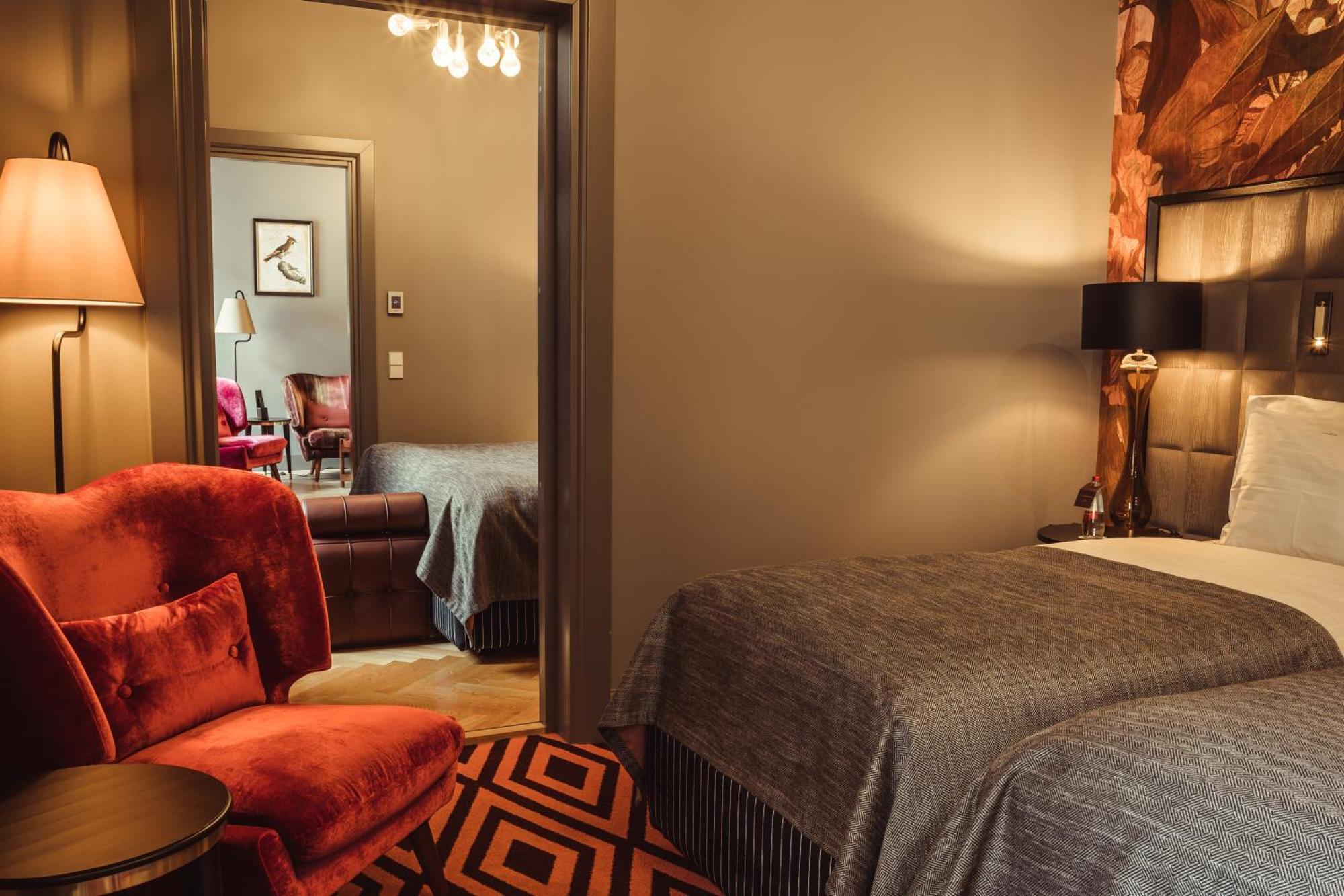 Grand Poet Hotel And Spa By Semarah Riga Luaran gambar A room at the hotel